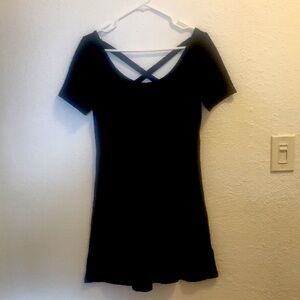 H&M Divided black skater dress with x-cross straps in back.